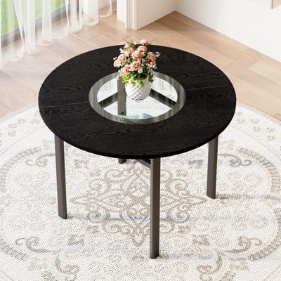 Moderne minimalistische ronde eettafel, 100 cm diameter, zwart houtnerfpatroon op het tafelblad, geschikt voor 2-4 personen (met grijs glazen inzetstuk en metalen stabilisatieframe).