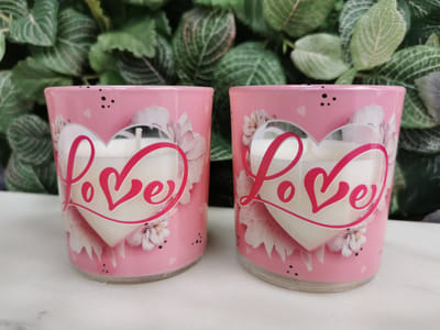 Set van 2 geurkaarsen LOVE  in mooie theelichthoudertjes bedrukt met bloemen , heerlijke bloemengeur