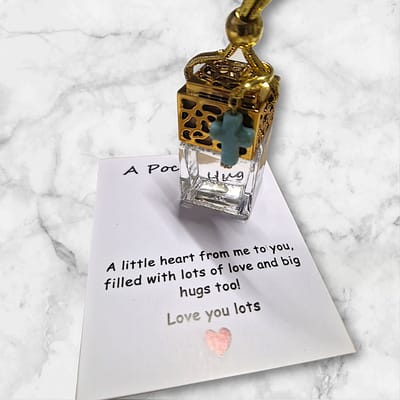 Auto parfum - Believe - Met pocket Hug - Kruisje - 8ml - Serenity - Turquoise - Autoparfum - Traditional Ritual Overseas - Valentijnsdag - Autogeur - Auto Parfum - Auto parfum mannen - Auto parfum vrouwen - Verjaardagscadeau - Cadeautje