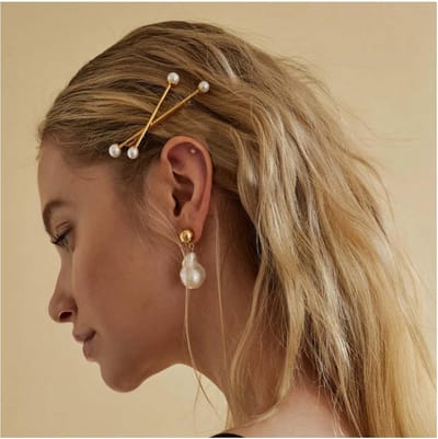 X-vormige gouden haarspeld met parel minimalistisch vintage decoratief