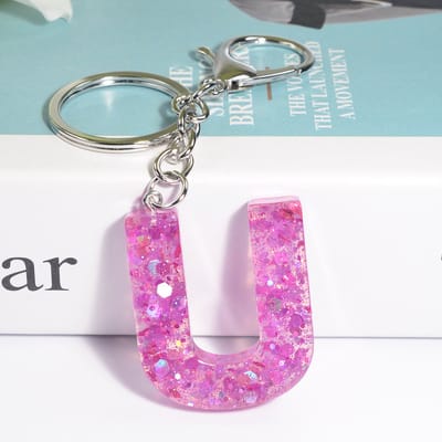 Sleutelhangers of voor je tas van A tot Z - met een pompon of kwastje - met letter - mooi design - handgemaakt - sleutelhangers - design - mode - goud - zwart - blauw - roze- rood