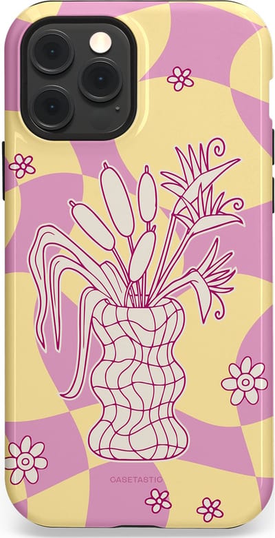 Casetastic Hoesje Geschikt voor Apple iPhone 12/12 Pro Magsafe - Stijlvolle Beschermende Duo-layer Case - Bosje vol roze