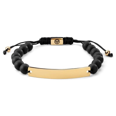 Verstelbare armband van onyx kralen met goudkleurig roestvrijstalen plaatje