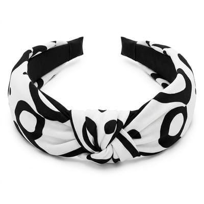 Wit zwarte haarband met knoop – dames diadeem met abstract patroon – modieuze haaraccessoire met brede band