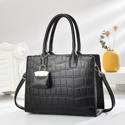 Nieuw Stenen Patroon Mode Moeder en Kind Tas Hanger Kleine Tas Eenvoudige en Sfeervolle Handtas Hoge Precisie Mode Schoudertas .