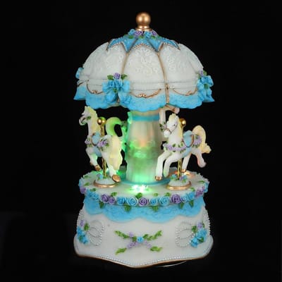 Draaiende Muziekdoos - Kerst Carrousel - Feestelijke Decoratie - Met Lichtjes - 17 cm Hoog - Blauw