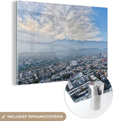 ® Glasschilderij 180x120 cm - Schilderij acrylglas - Wolkenvelden pakken zich samen boven de industriestad Monterrey in Mexico - Foto op glas - Muurdecoratie woonkamer - Wanddecoratie slaapkamer - Schilderijen