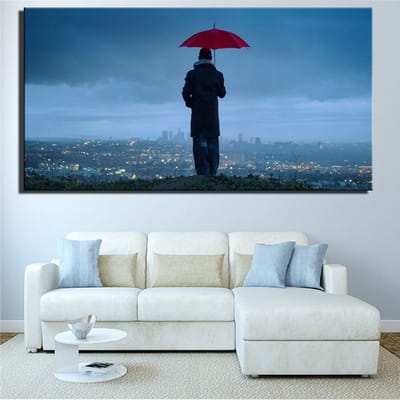 Allernieuwste.nl® Canvas Schilderij Moderne Stad met Man met Paraplu - Kunst aan je Muur - Realistisch - Kleur - 50 x 100 cm