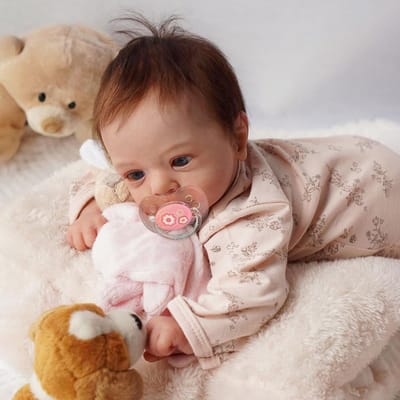 Levensechte Babypop - Poppen Baby - Spelen en Verzorgen - Zacht Verzwaard Lichaam - 48 cm - Roze