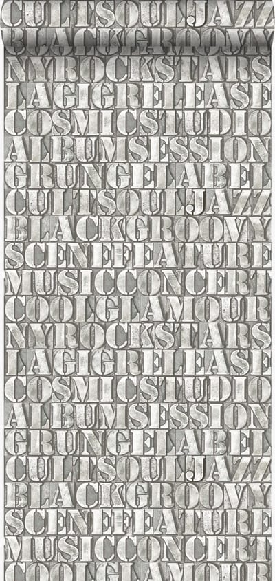 Origin Wallcoverings behang oude ijzeren zetletters beige - 347593 - 53 cm x 10,05 m