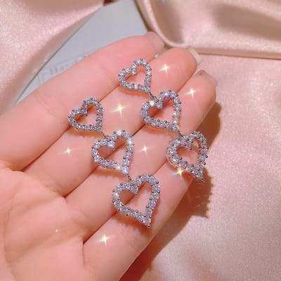 High-End Niche Design Modieuze en Veelzijdige Liefdesoorbellen voor Vrouwen Perzik Hartvormige Oorbellen gray
