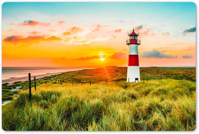 Placemats 45x30 cm - Placemat kunststof - 1 stuk - Vuurtoren - Natuur - Zon - Landschap - Gras - Strand - Zee - Borden onderleggers - Decoratie voor op tafel - Keuken tafeldecoratie accessoires - Vinyl onderlegger - Tafelversiering