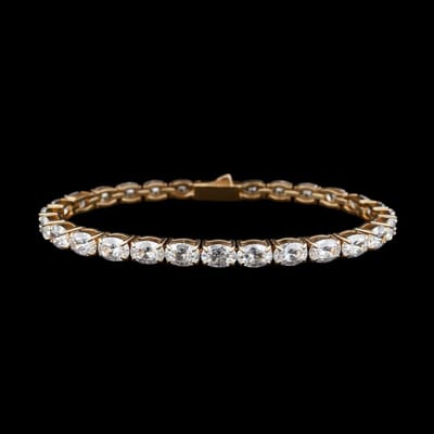 Victoria Valenza Goudkleurige RVS Tennisarmband met Ovale Zirkonia Stenen - Armband - RVS - Goudkleurig - Tennisarmband - Zirkonia
