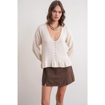 Lichte V-hals gebreide top met knoopdetails