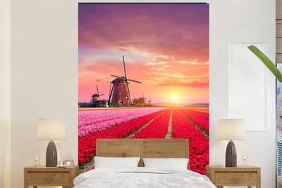 Behang - Fotobehang Bloemen - Windmolen - Tulpen - Zonsondergang - Roze - Breedte 195 cm x hoogte 300 cm