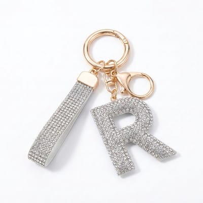 Zilverkleurige sleutelhanger met letter R en strass steentjes – initial sleutelhanger voor dames en heren – metalen sleutel hanger met ronde ring en decoratieve letter hanger