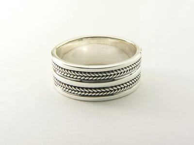 Zilveren ring met kabelpatronen - maat 16