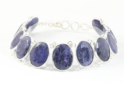 Zware zilveren armband met grote blauwe saffier stenen