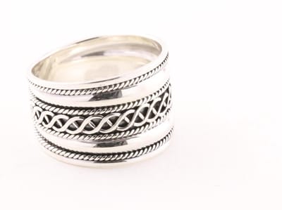 Brede hoogglans zilveren ring met kabelpatronen - maat 19