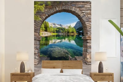 Behang - Fotobehang Doorkijk - Berg - Landschap - Water - Breedte 225 cm x hoogte 350 cm