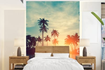 Behang - Fotobehang Zee - Zonsondergang - Palmboom - Wolken - Breedte 190 cm x hoogte 260 cm