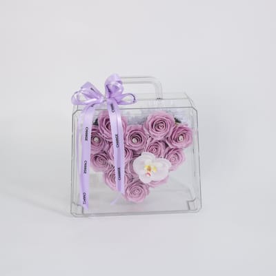La Roselle Amsterdam Kunst rozen Lavender Heart Case – Luxe Paarse Kunstrozen in Transparante Handtas – Hartvormig Bloemenarrangement met Orchidee