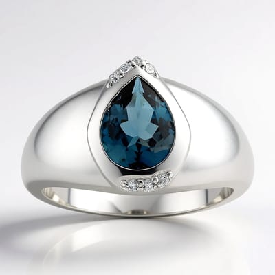Cavill - 925 Sterling Zilver Palladium Ring - 1,012 ct Peervormige Londen Blauwe Topaas - 7 Sprankelende Zirconia - Elegante Damesring - Luxe Sieraad