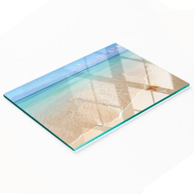 Stijlvol en duurzaam glazen bord met een print van een zeester op het strand, 80x52 cm