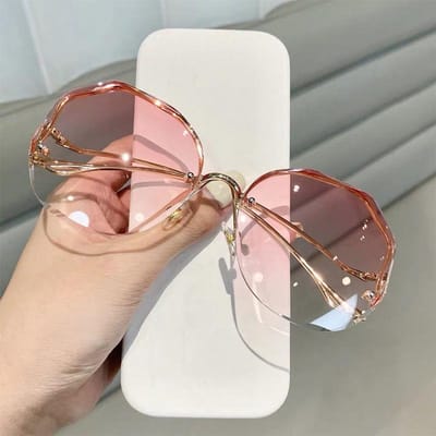 Randloze Zonnebril Bril Dames Oceaan Water Cut Oogbescherming Dames Heren Geslepen Lens Duurzaam Metaal Metal Gebogen Tempels Zon Zonnebril Vrouwelijk UV400 only 1pcs sunglasses