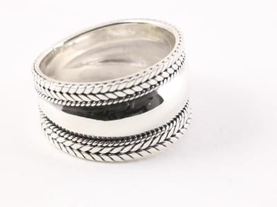 Brede hoogglans zilveren ring met kabelpatronen - maat 19.5