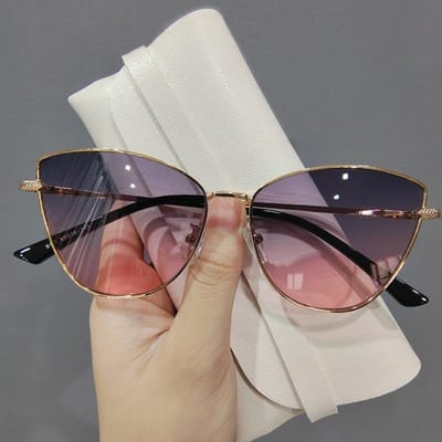 Lunettes de soleil œil de chat vintage pour femmes Mode Monture métallique Protection UV400 Teintes tendance Lunettes de soleil populaires pour dames