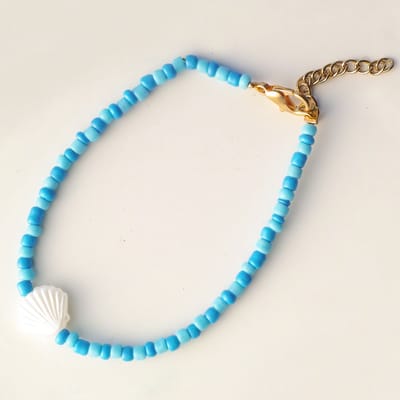 Armbandje blauwtinten met schelp