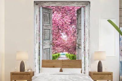 Behang - Fotobehang Sakura - Doorkijk - Boom - Kersenbloesem - Breedte 200 cm x hoogte 300 cm