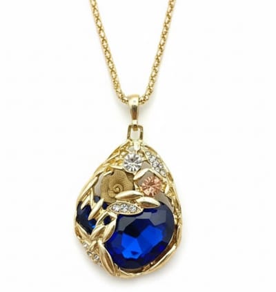 Goudkleurige ketting met druppelvormige blauwe hanger en bladmotief – ketting voor dames – vintage stijl – ketting met hanger