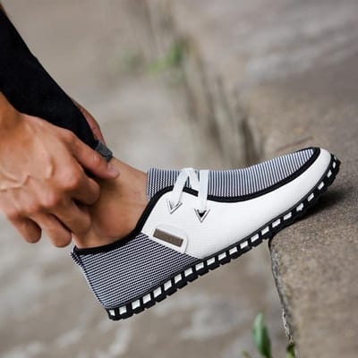 Épissage hommes chaussures en cuir décontractées mode confortable affaires homme chaussure été printemps lumière grande taille chaussures nouvel homme baskets 45 white