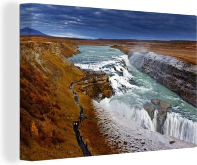 Canvas Schilderij Donkere lucht bij de Gullfoss waterval in IJsland - 120x80 cm - Wanddecoratie