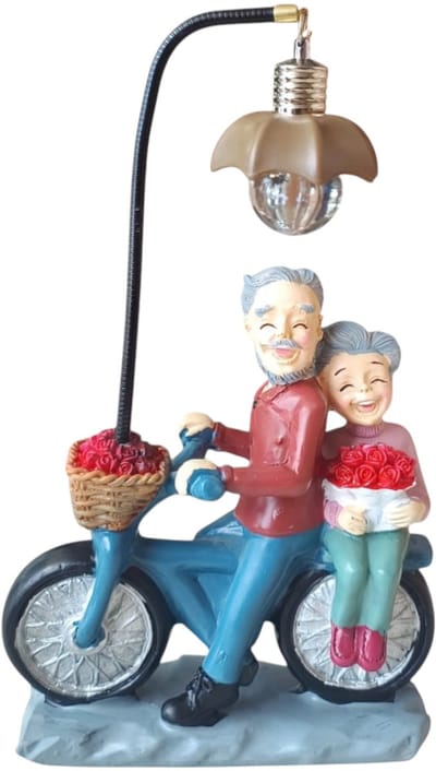 Decoratief Figuurtje van Oud Koppel op Fiets met Lamp
