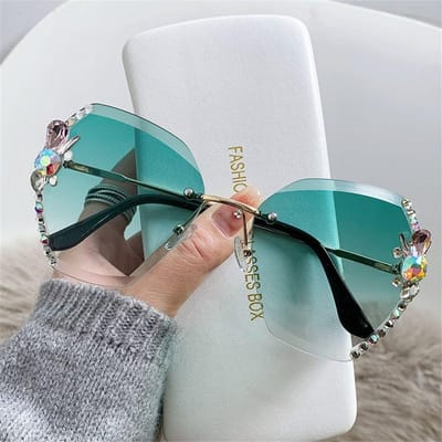 UV-bescherming Randloos Strass Zonnebril Strand/Reis/Streetwear Glanzende Geslepen Lens Zonnebril Randloos Brillen ontworpen voor dames blue