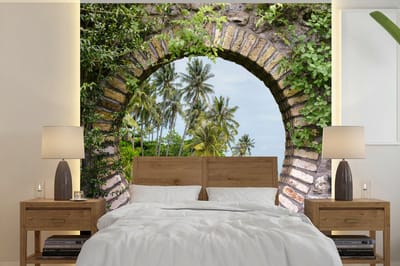 Behang - Fotobehang Palmbomen - Tropisch - Doorkijk - Strand - Breedte 300 cm x hoogte 300 cm