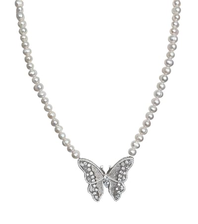 N3 Collecties Lange Parelcollier met vlinder zirkoon hanger