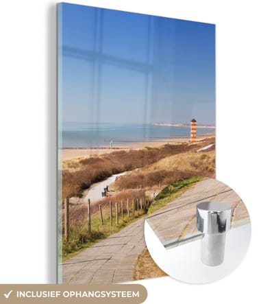 MuchoWow® Glasschilderij 60x80 cm - Schilderij acrylglas - Strand - Zee - Vuurtoren - Nederland - Foto op glas - Muurdecoratie woonkamer - Wanddecoratie slaapkamer - Schilderijen