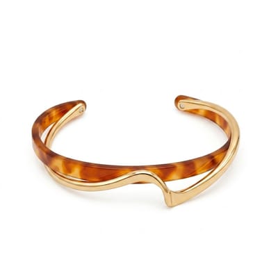 Wit goudkleurige bangle armband voor dames – metalen armband met golvend design
