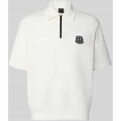 loose fit poloshirt met labelstitching