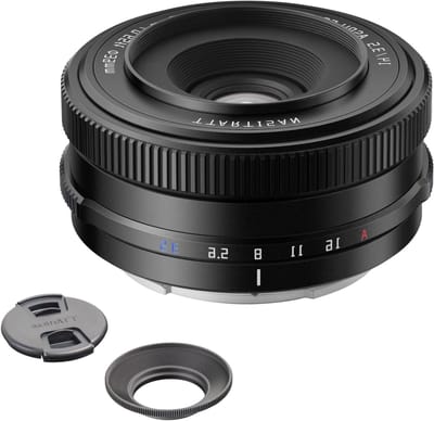 14mm F3.5 E-mount lens voor APS-C camera's, perfect voor architectuur, landschap en reisfotografie, lichtgewicht en compact ontwerp.