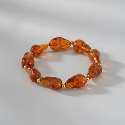 Dames Elastische Resin Armband – Amber Bruin & Goudkleurig RVS – Trendy Kralenarmband