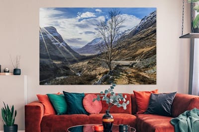 Canvas schilderij 180x120 cm - Wanddecoratie Zonnestralen boven de enorme Ben Nevis in Schotland - Muurdecoratie woonkamer - Slaapkamer decoratie - Kamer accessoires - Schilderijen