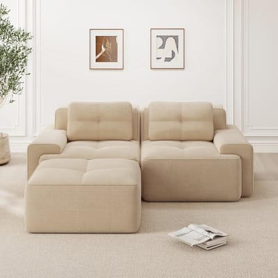 Moderne L-vormige woonkamerbank - diepe zitting - corduroy cloud-bank met voetenbank - dubbele slaapbank met stiksels - beige