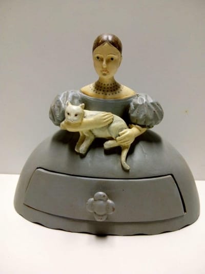 Meisje met kat lade kastje