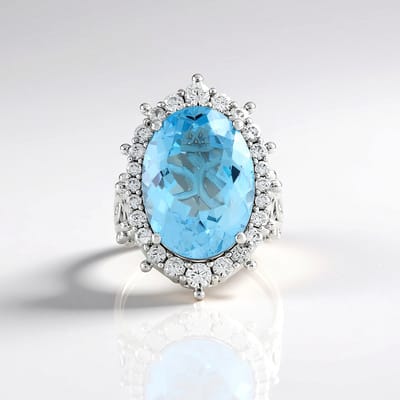 Cavill - Zilveren Ring - 925 Sterling Zilver Rhodium - Hemelblauwe Topaas 12,24 ct Ovaal uit Brazilië - Elegante Ring met Zirkonia - Dames Sieraad