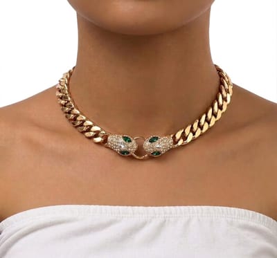 Goudkleurige schakel ketting voor dames met dubbele panterkop hanger en strass